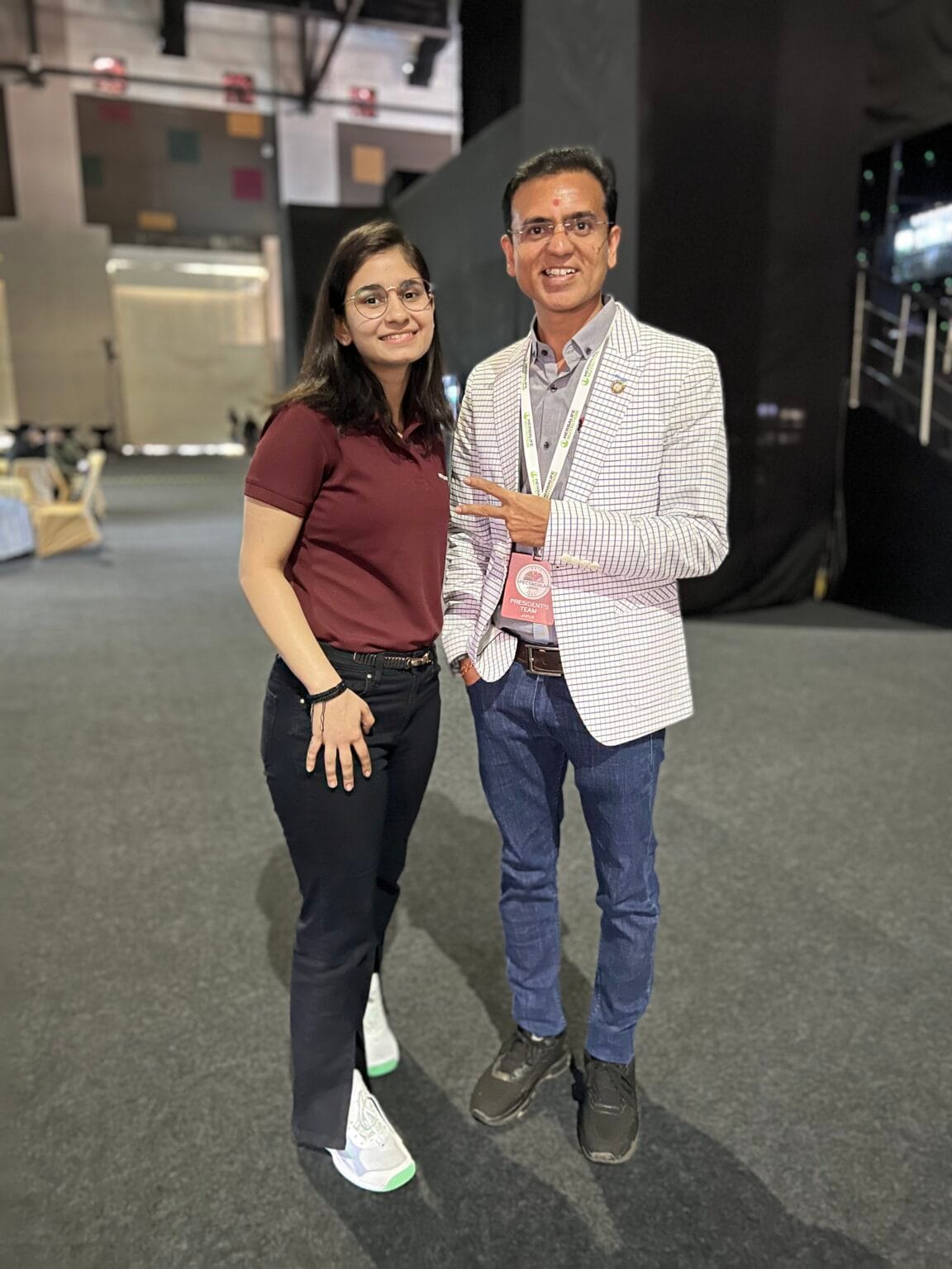 Amit Sarvaiya with a community member at a wellness event